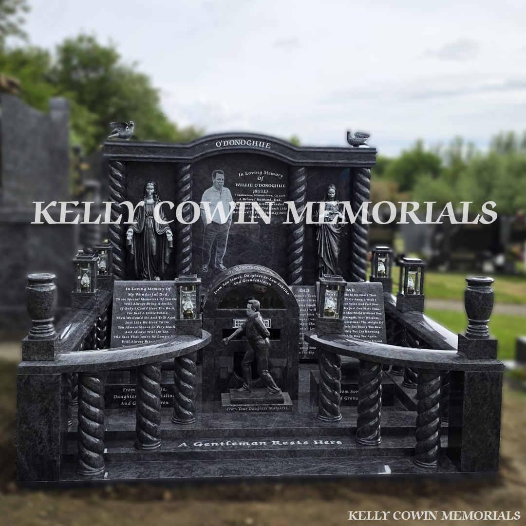 Front view of Blue Lagoon custom memorial with twisted pillars and silver statues in Cork cemetery