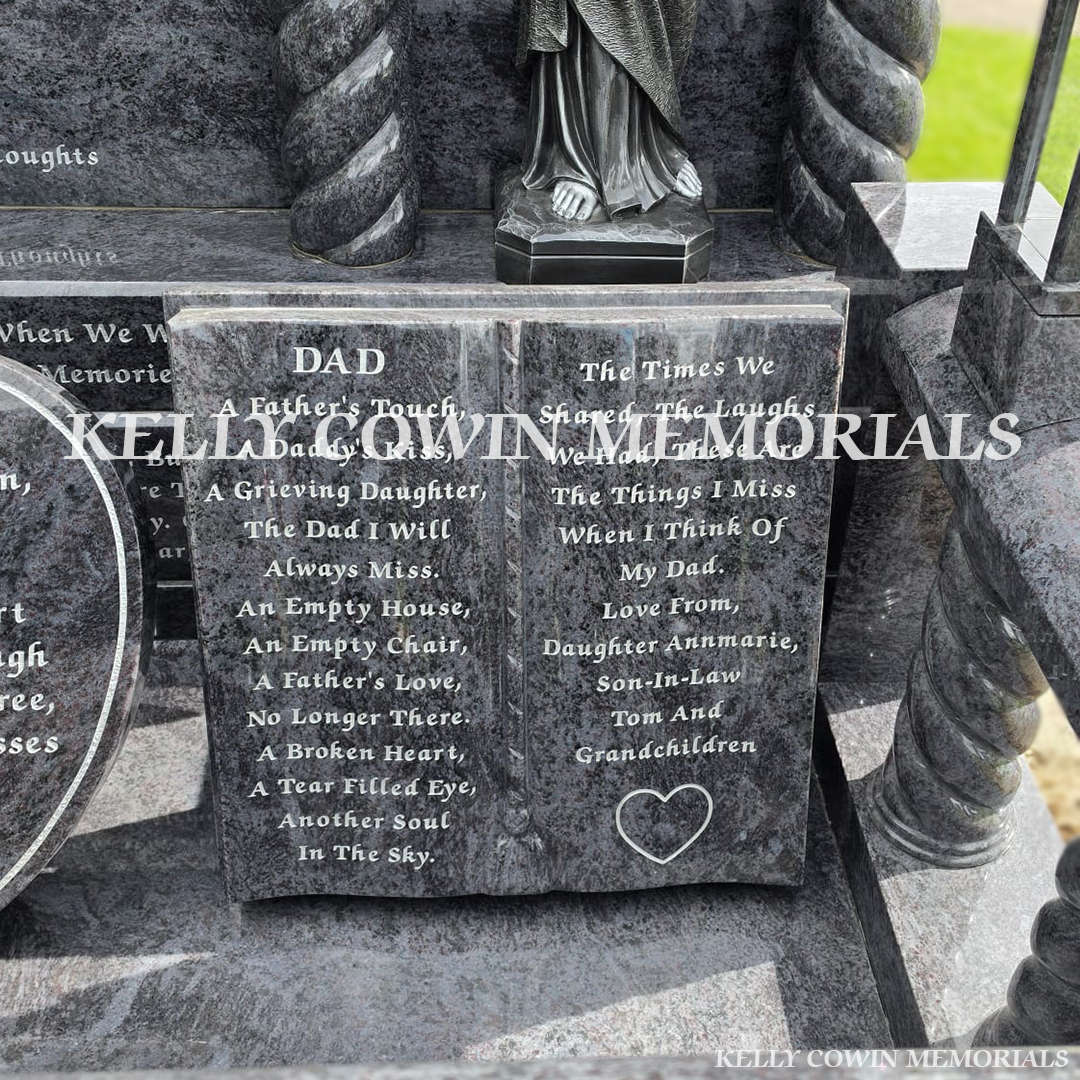 Close-up of large blue lagoon bible on Blue Lagoon headstone