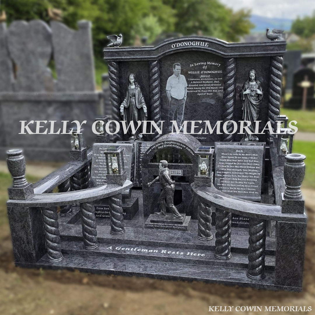 Front view of Blue Lagoon custom memorial with twisted pillars and silver statues in Cork cemetery