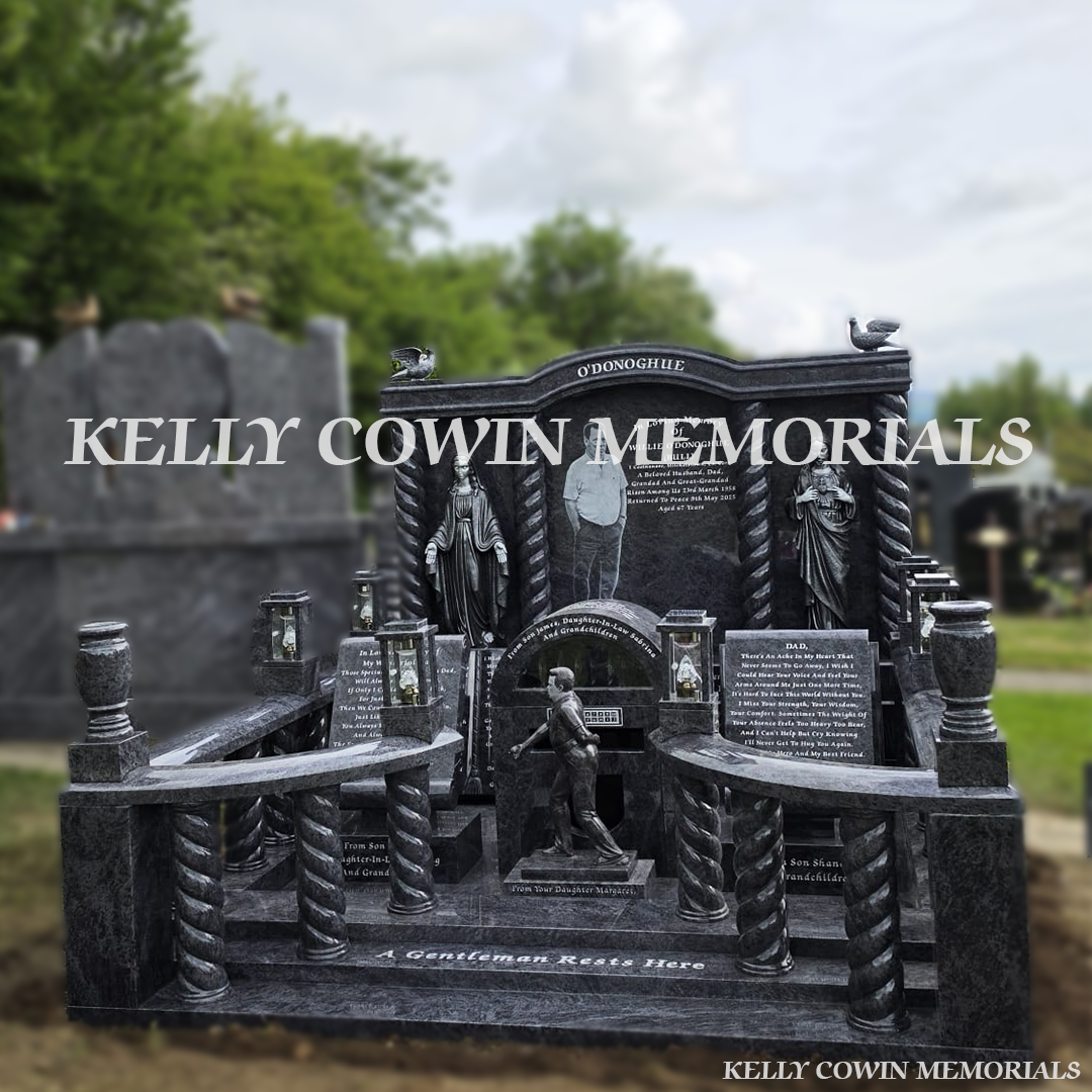 Front view of Blue Lagoon custom memorial with twisted pillars and silver statues in Cork cemetery