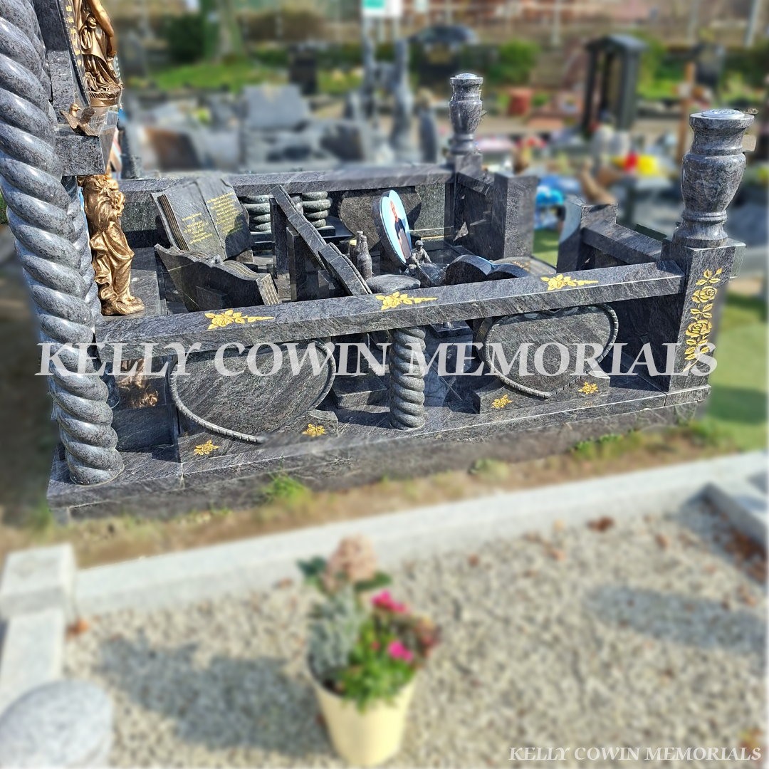 Side view of Blue Lagoon memorial with railings, pillars and granite flooring