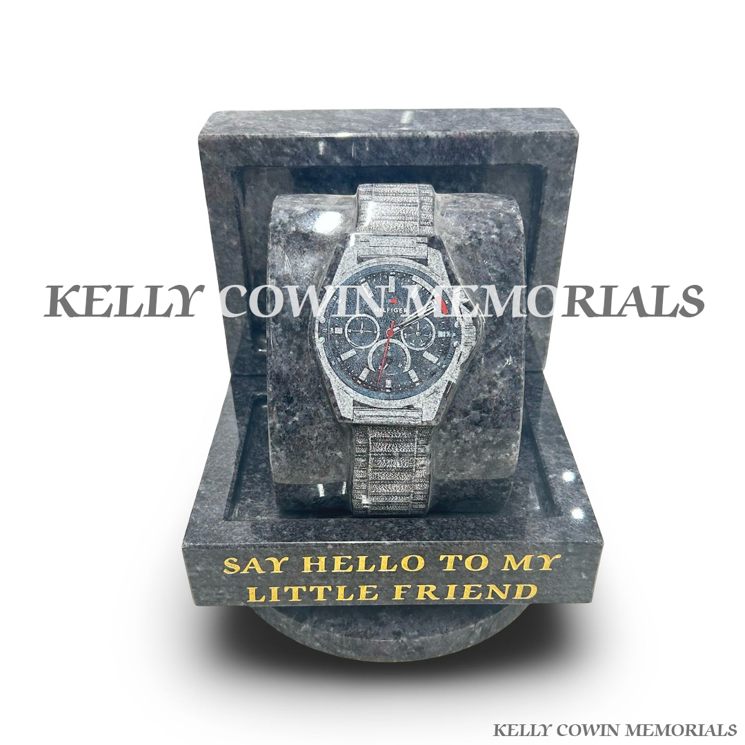 Blue Lagoon granite memorial watch ornament featuring a detailed Tommy Hilfiger style laser engraved watch image with 23.5-carat gold inscription, handcrafted by Kelly Cowin Memorials for personalised memorials across Dublin and Ireland.