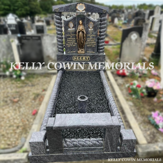 Front view of Blue Lagoon Gates of Heaven headstone with gold inscription and bronze Our Lady statue in Balgriffin Cemetery Dublin