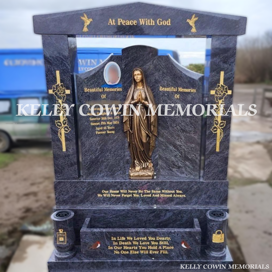 Front view of Blue Lagoon granite Gates of Heaven headstone with gold inscription and bronze Our Lady statue in Balgriffin Cemetery Dublin