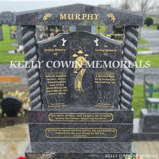 Front view of Blue Lagoon Gates of Heaven headstone with gold inscription and twisted pillars in Dardistown Cemetery Dublin