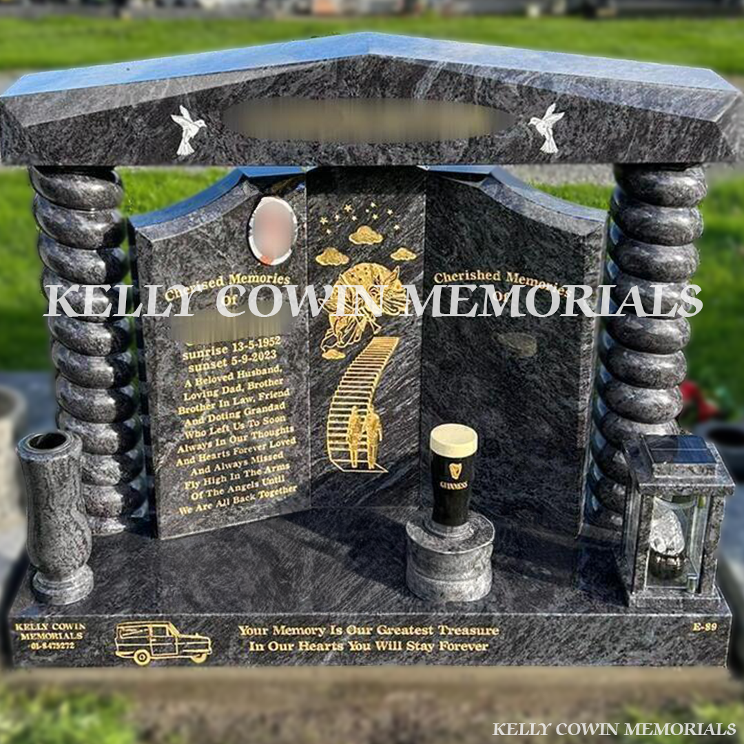 Front view of Blue Lagoon gates of heaven headstone with twisted pillars and gold inscription in Newlands Cross Cemetery