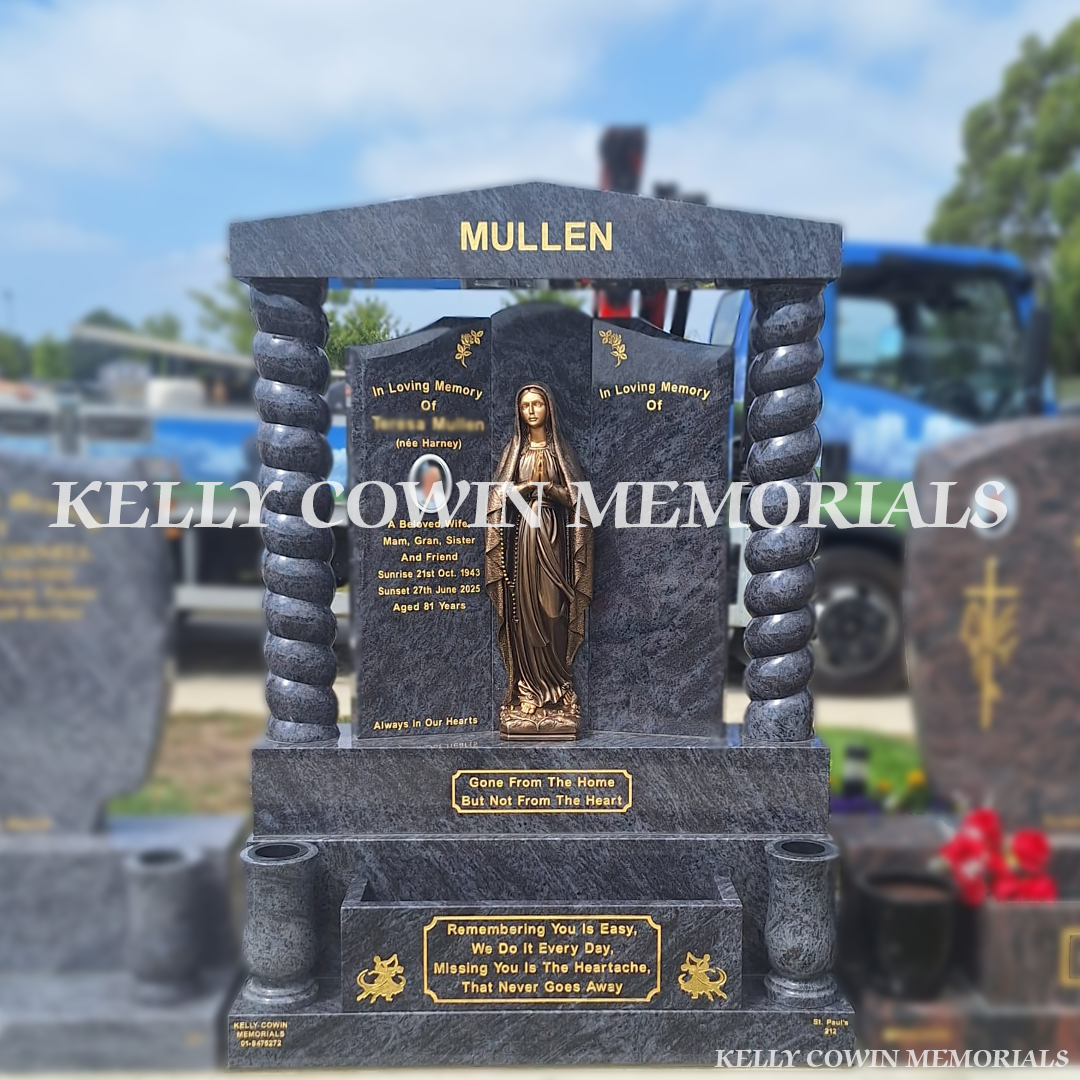 Blue Lagoon Gates of Heaven headstone with Bronze Our Lady flat back statue, twisted columns, two granite vases, flower box and 23.5ct gold leaf inscription installed in Balgriffin Cemetery Dublin by Kelly Cowin Memorials.