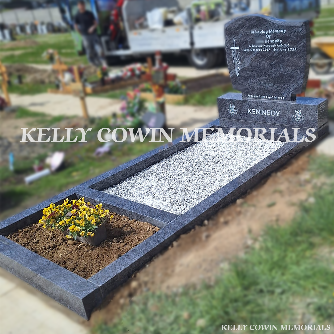 Side view of Blue Lagoon memorial with kerbing and garden area