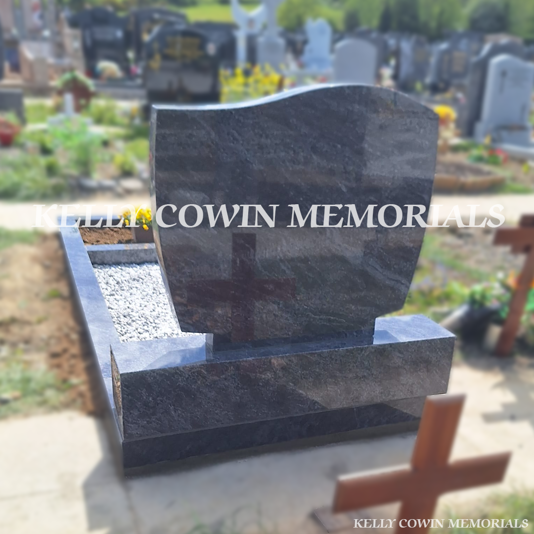 Back view of Blue Lagoon memorial with kerbing and garden area