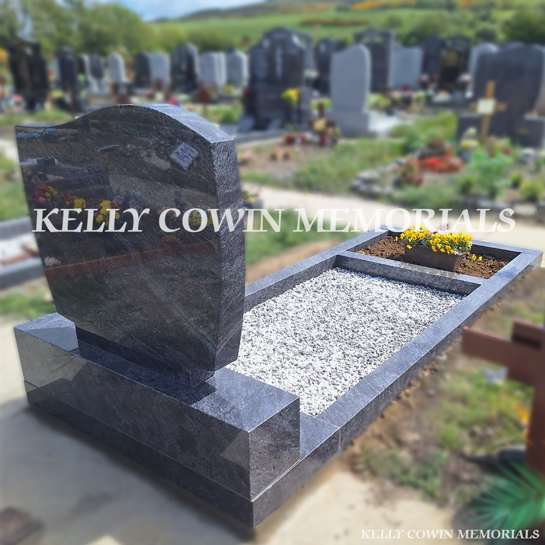 Side view of Blue Lagoon memorial with kerbing and garden area