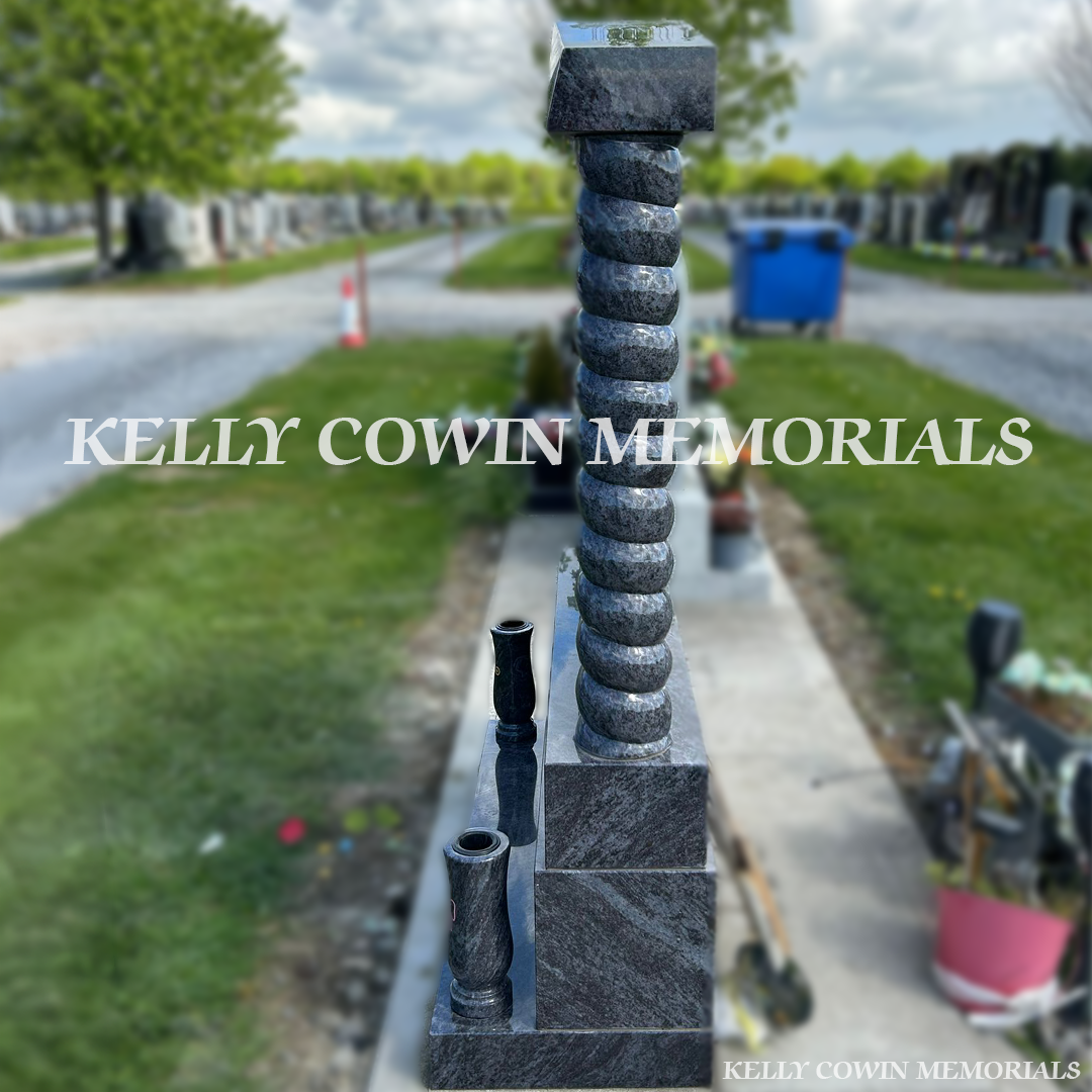Side view of Blue Lagoon children’s memorial with tall vases