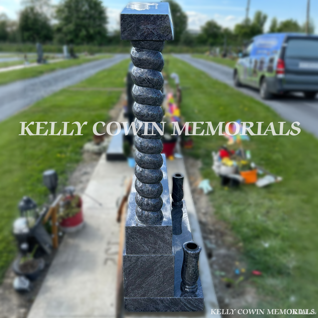 Side view of Blue Lagoon children’s memorial with tall vases