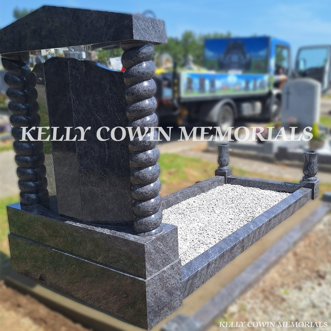 Side view of Blue Lagoon memorial with kerbing, vases and flower box