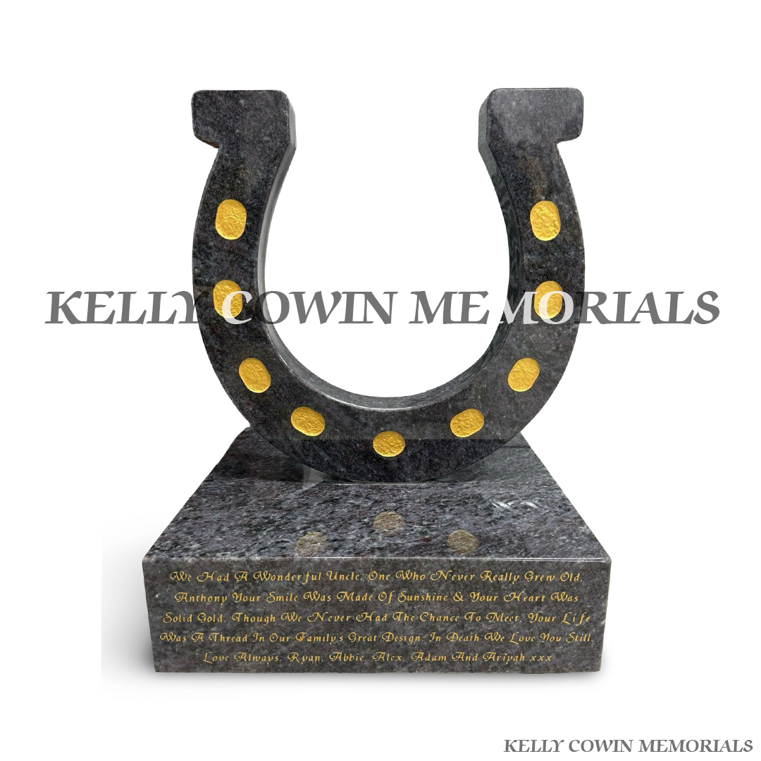 Front view of Blue Lagoon granite horseshoe memorial accessory on plinth