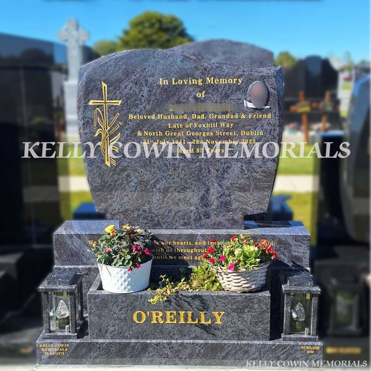 Blue Lagoon granite headstone with gold engraving and flowerbox, x2 solar lanterns &oval photograph by Kelly Cowin Memorials, installed for Balgriffin Cemetery.