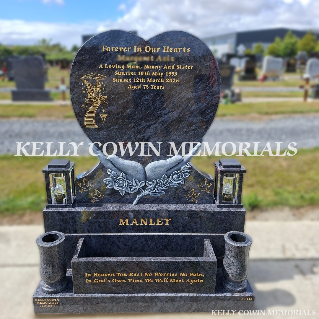 Blue Lagoon heart headstone with antique hands, two solar lanterns, two large granite vases, flower box and gold leaf inscription installed in Dardistown Cemetery Dublin by Kelly Cowin Memorials.