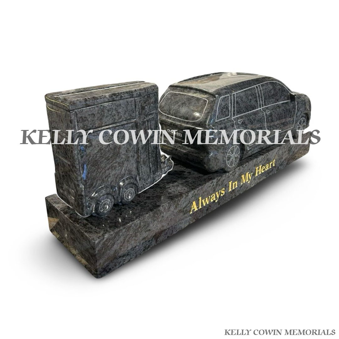 Side view of polished Blue Lagoon granite jeep and horse box ornament