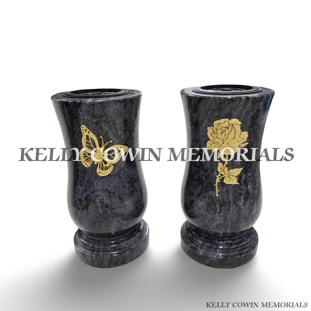 Large Blue Lagoon polished granite grave vases with natural blue-grey stone patterns, gold engraved design, curved shape, matching granite base and removable flower holder by Kelly Cowin Memorials Ireland.