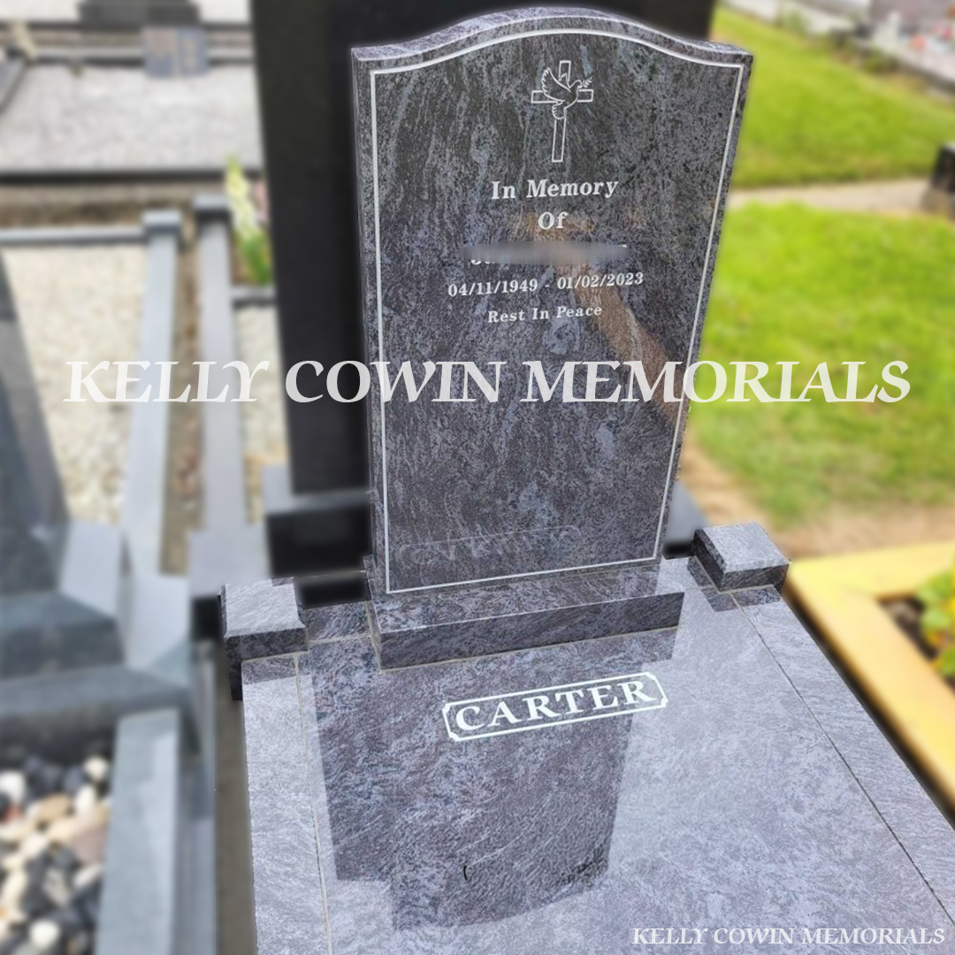Front close-up view of Blue Lagoon OG headstone with silver inscription in Donabate Cemetery