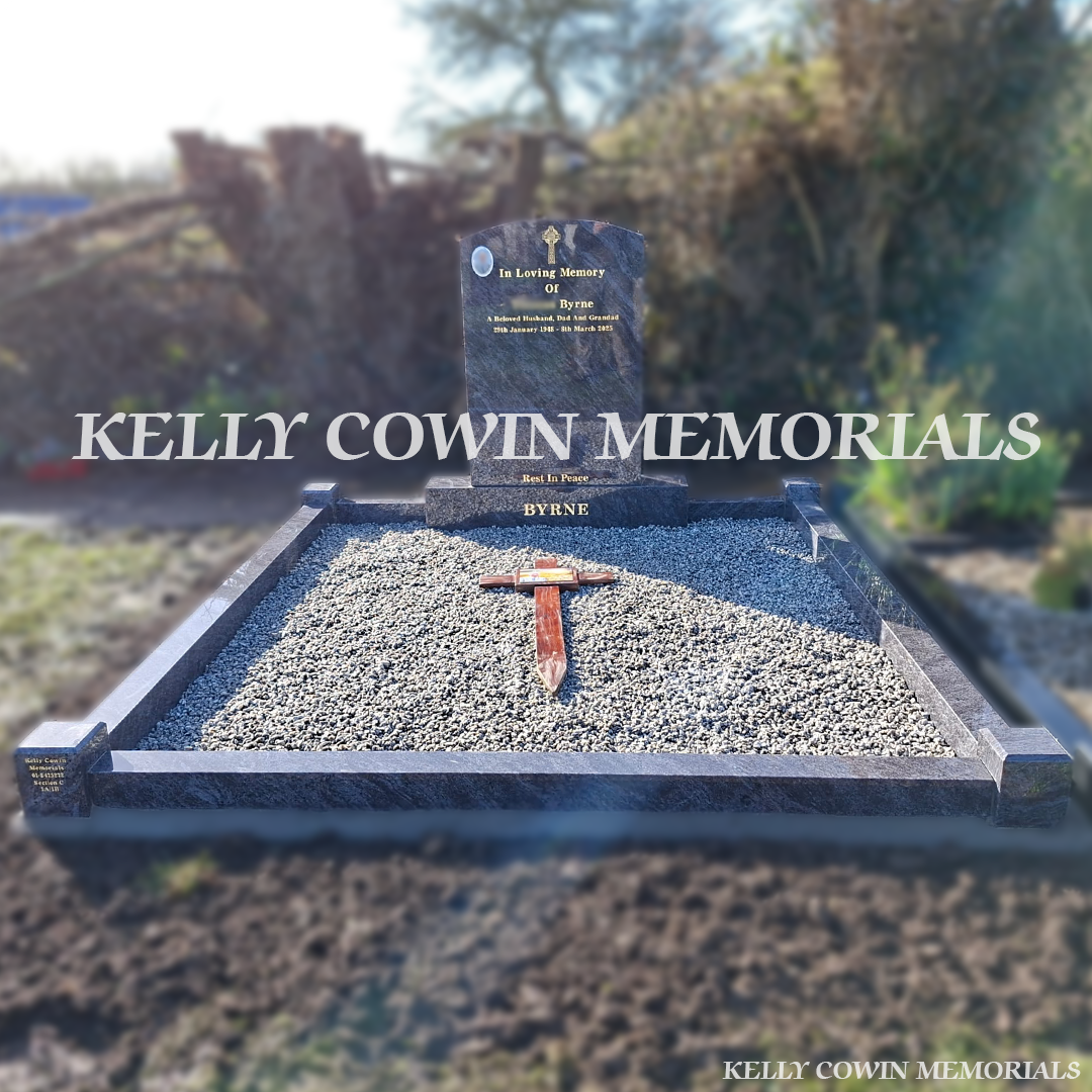 Front view of Blue Lagoon polished boulder headstone with gold inscription in Balscadden Cemetery