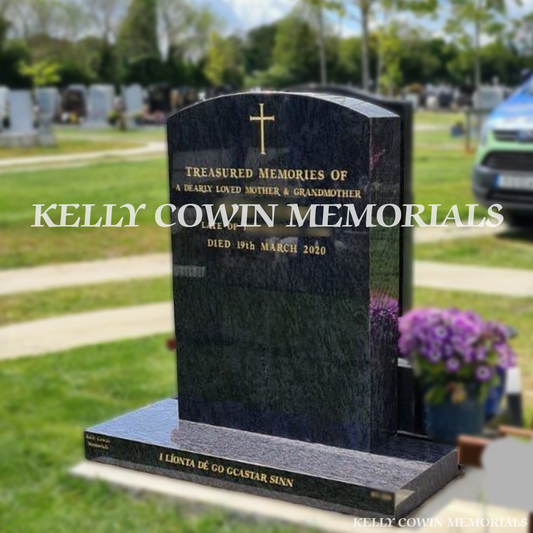 Front view of Blue Lagoon polished boulder headstone with gold inscription on plinth in Dardistown Cemetery Dublin