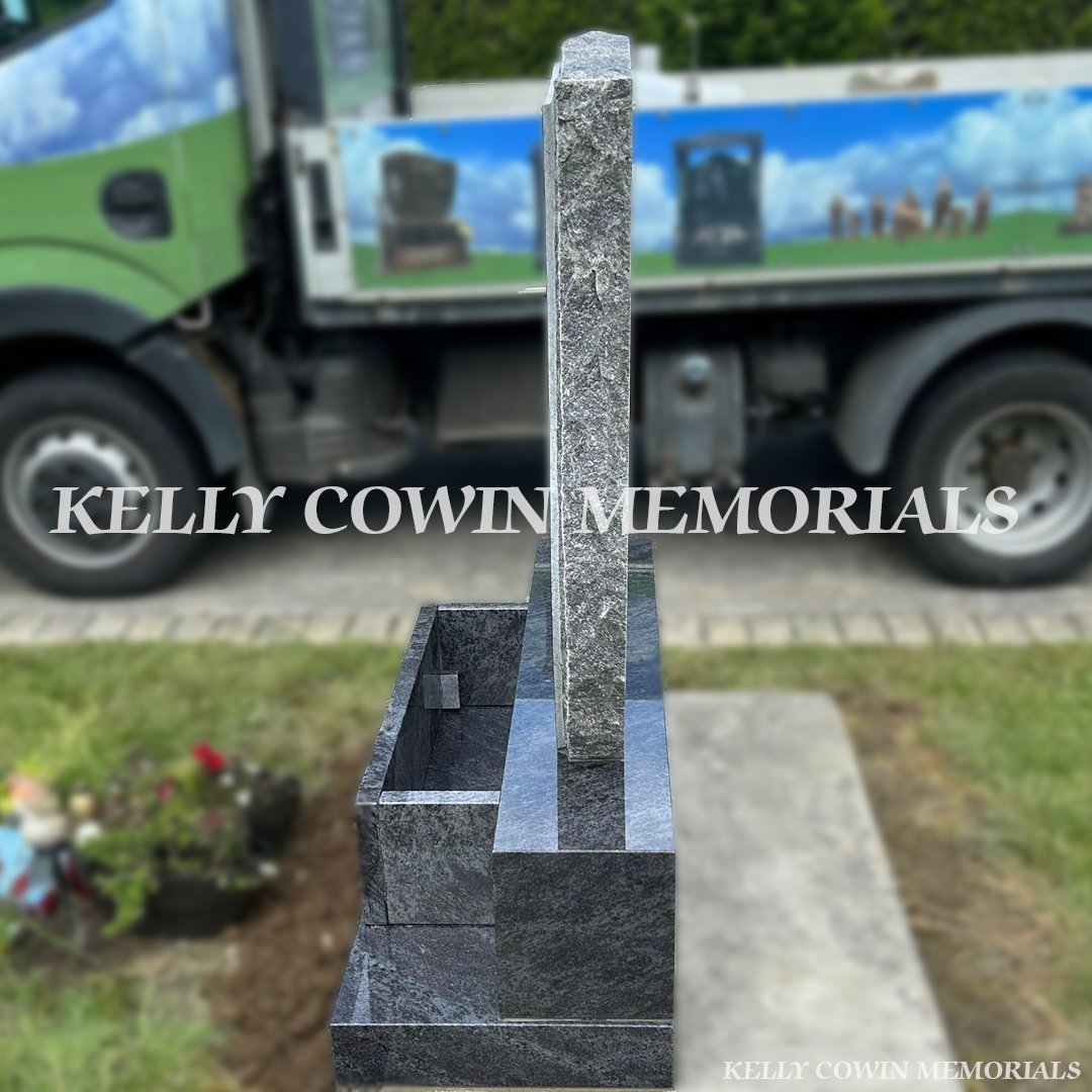 Side view of Blue Lagoon memorial with flower box and plinth