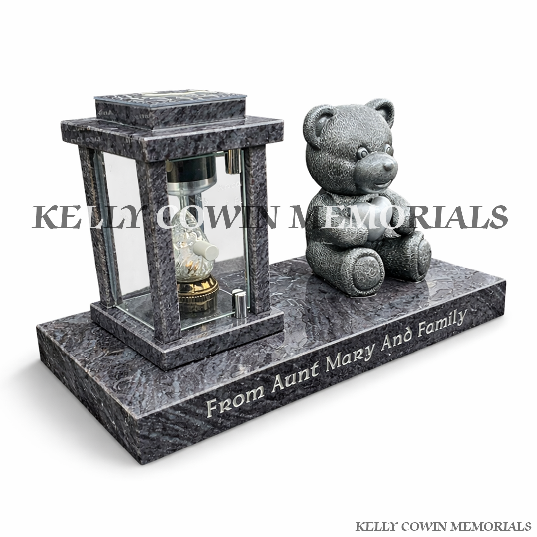 Front view of Blue Lagoon solar lantern on plinth with silver engraving and teddy bear statue
