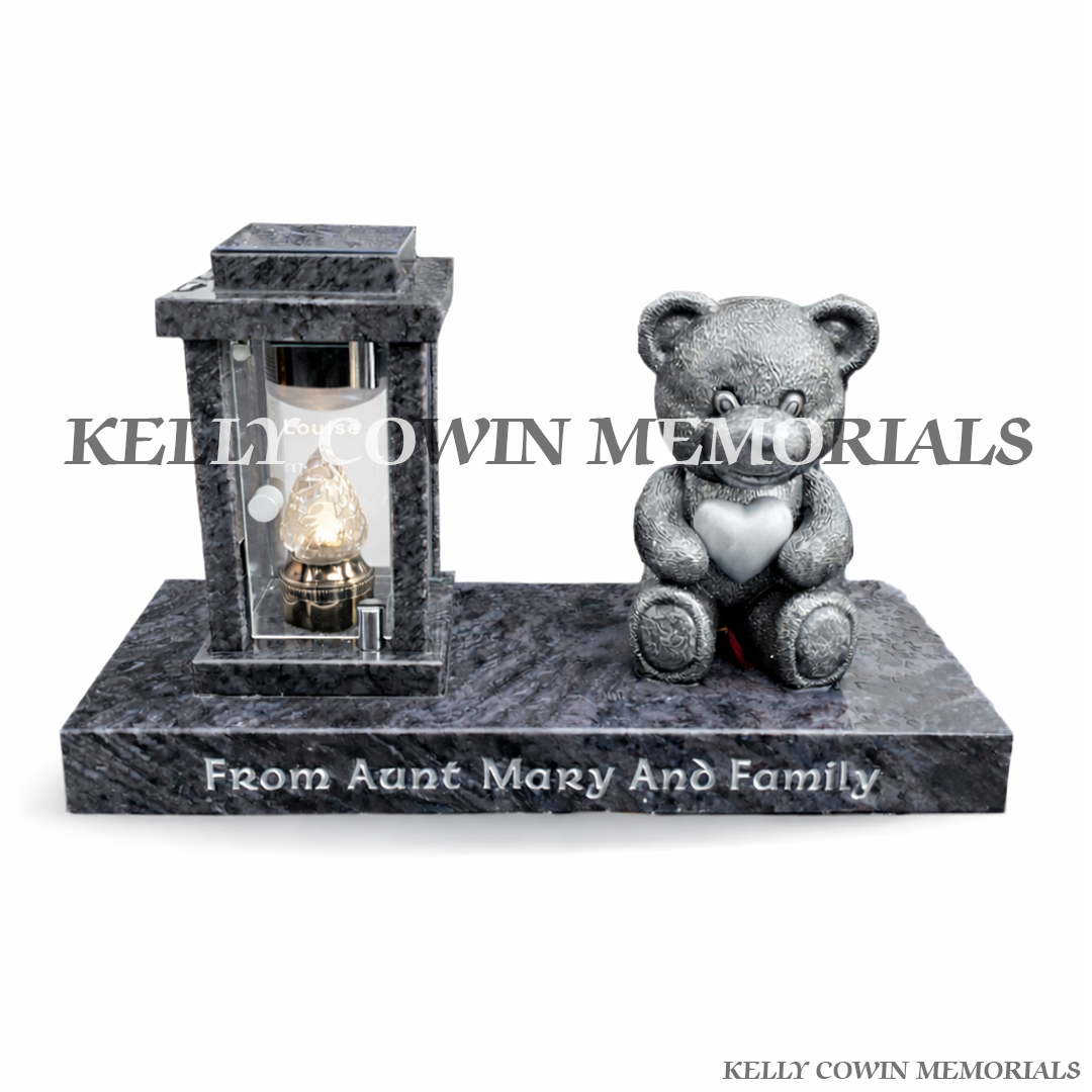 Front view of Blue Lagoon solar lantern on plinth with silver engraving and teddy bear statue