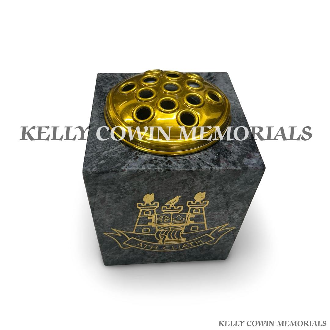 Close-up of gold Dublin crest engraving on Blue Lagoon granite vase