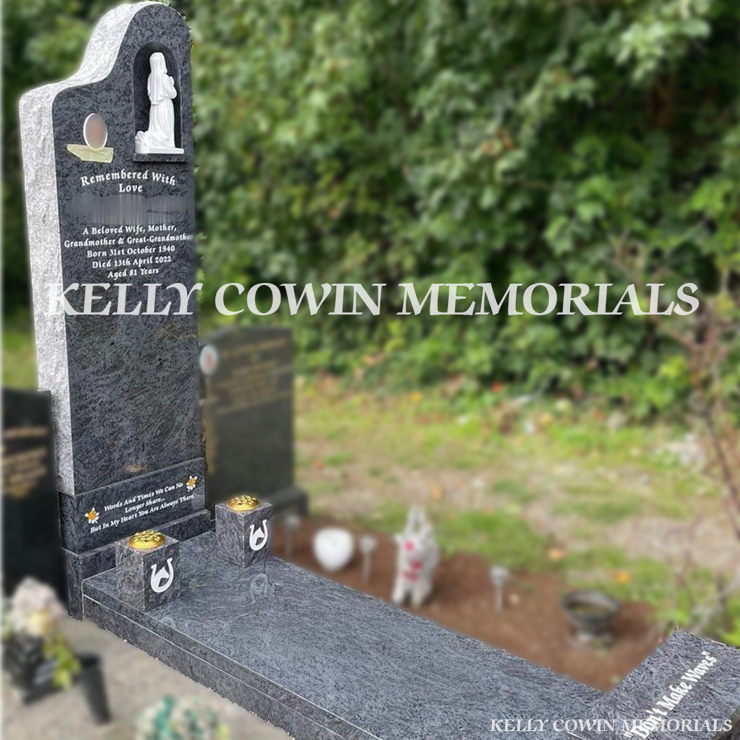Side view of Blue Lagoon Tall Grotto memorial showing rough edges, slab, and bench in Glasnevin Cemetery