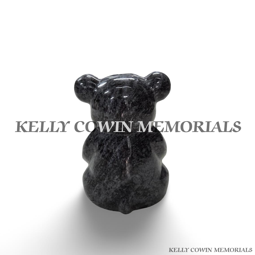 Rear view of Blue Lagoon granite teddy bear grave accessory showing the polished natural blue-grey granite finish and rounded teddy bear design.