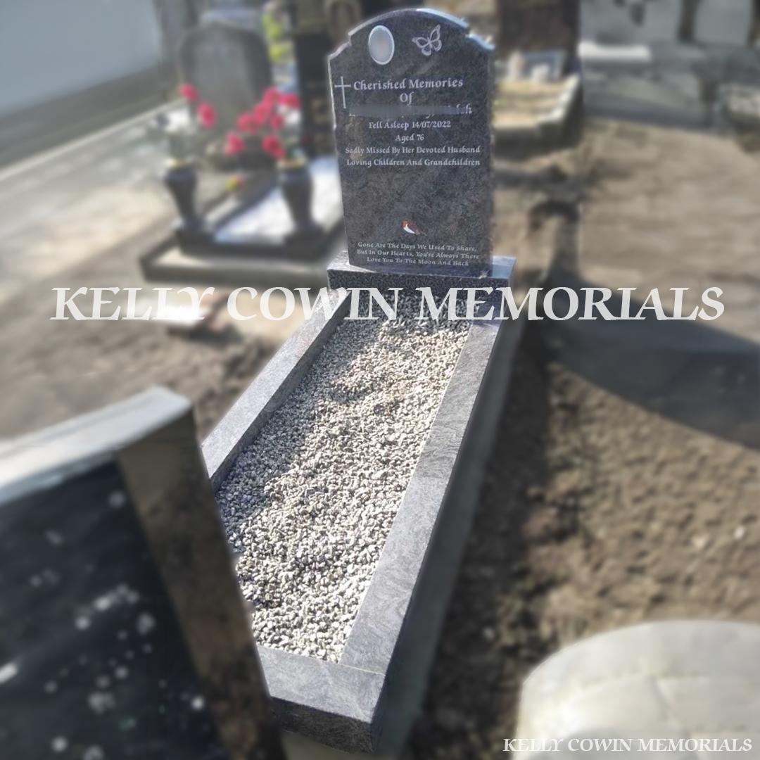 Front view of Blue Lagoon Top 9 headstone with silver inscription in Mount Jerome Cemetery