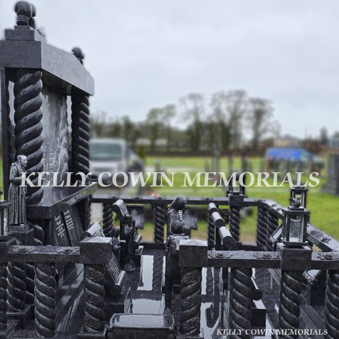 Side view of Traveller-style Blue Lagoon headstone with lanterns and granite statues in Limerick – Kelly Cowin Memorials