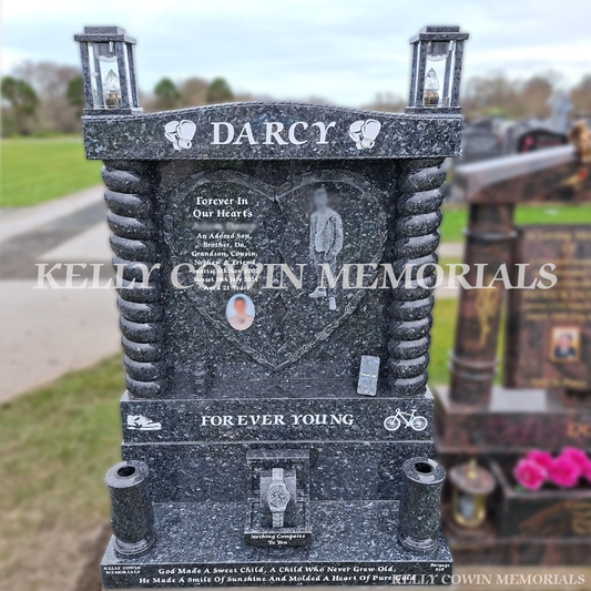 Blue Pearl carved heart children’s headstone with Forever Young inscription in Balgriffin Cemetery Dublin