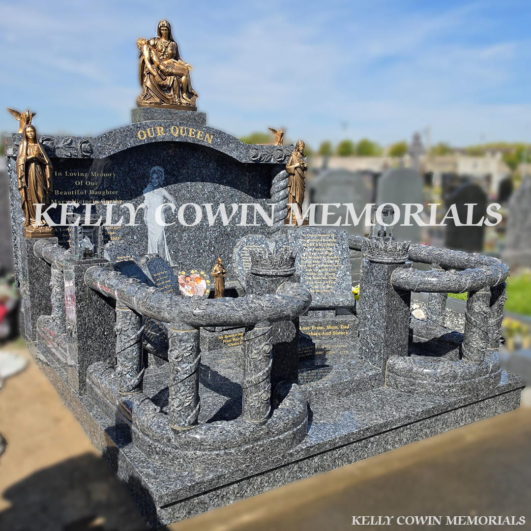 Side view of Blue Pearl memorial with railings, pillars and custom accessories