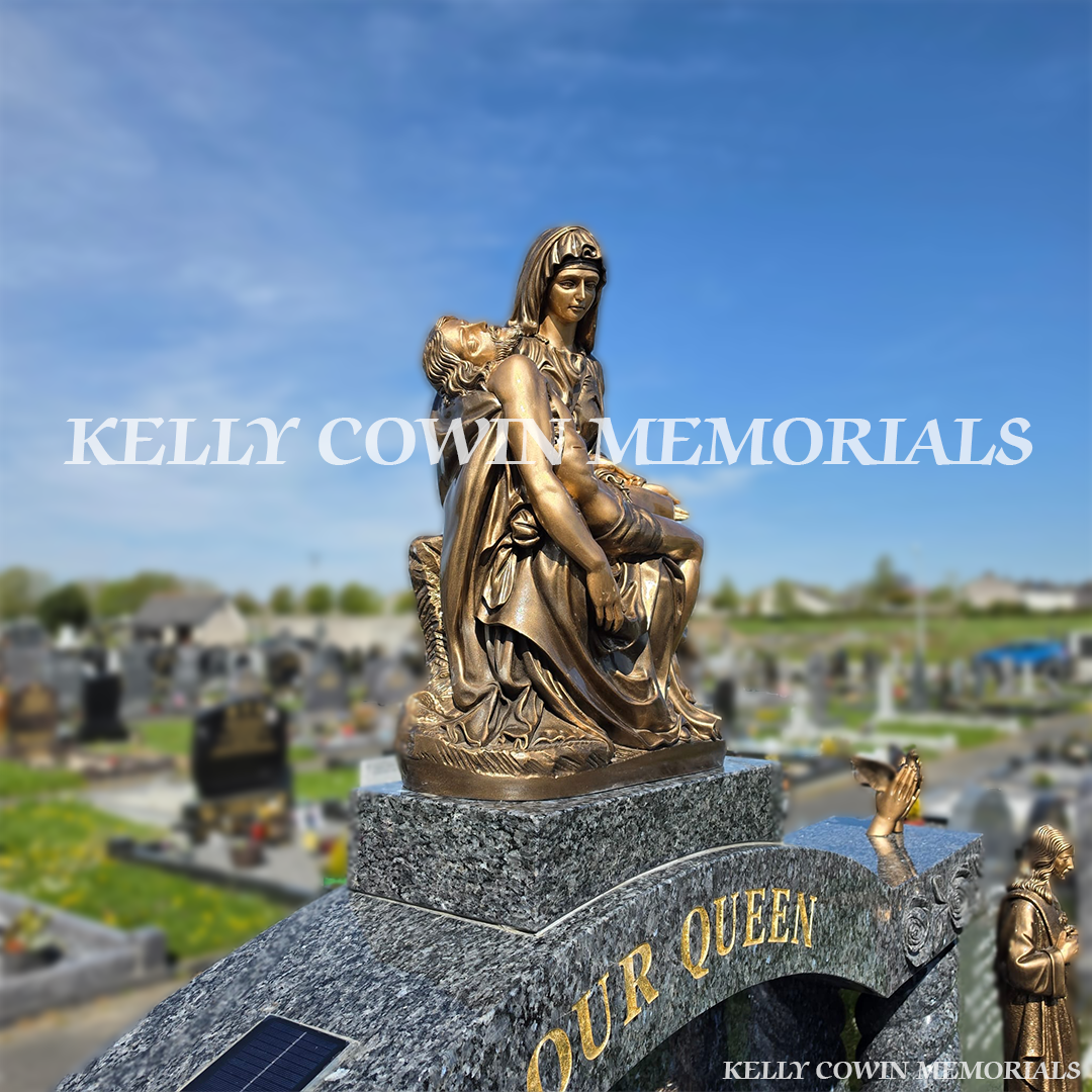 Close-up of Bronze Pieta statue on Blue Pearl Cap