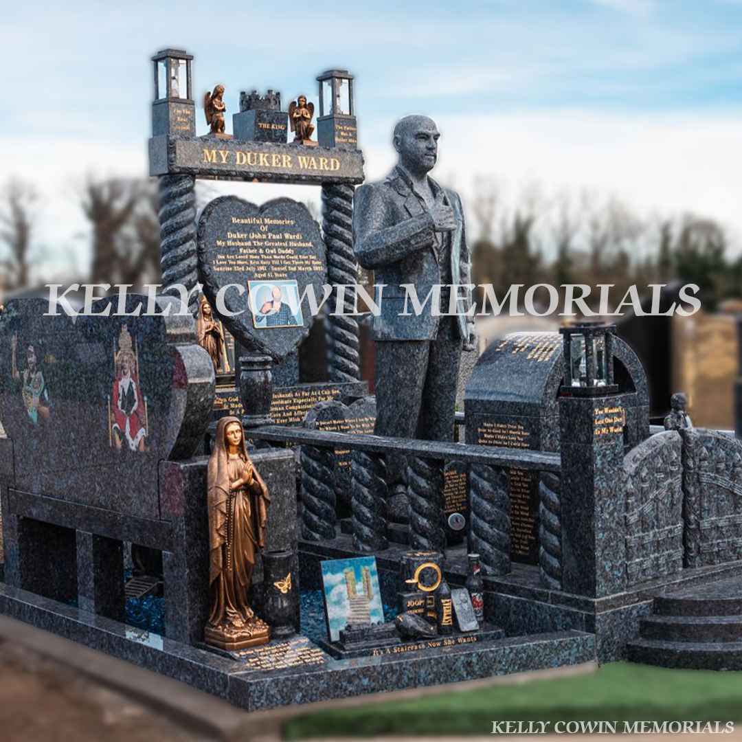 Blue Pearl Traveller custom headstone with life-size statue, twisted pillars and gates in Fingal Cemetery, North Dublin