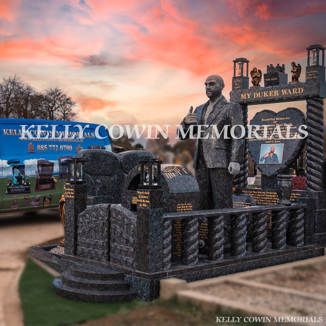 Blue Pearl Traveller custom headstone with life-size statue, twisted pillars and gates in Fingal Cemetery, North Dublin