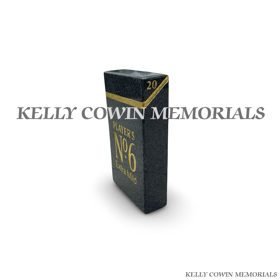 Side view of polished black granite cigarette box ornament