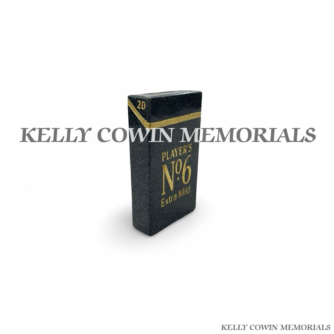 Side view of polished black granite cigarette box ornament