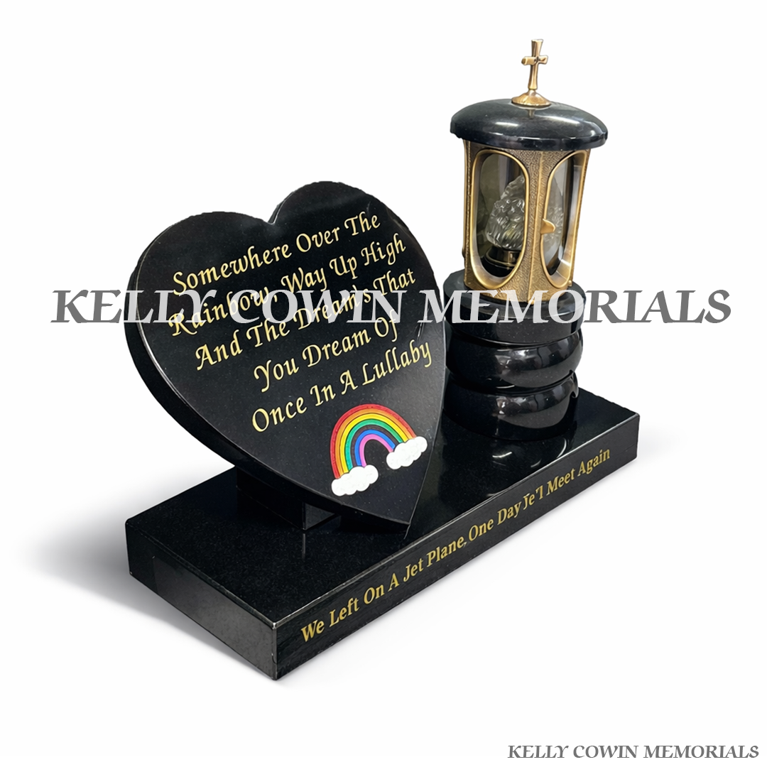 Side view of bronze lantern with candle insert mounted on granite plinth