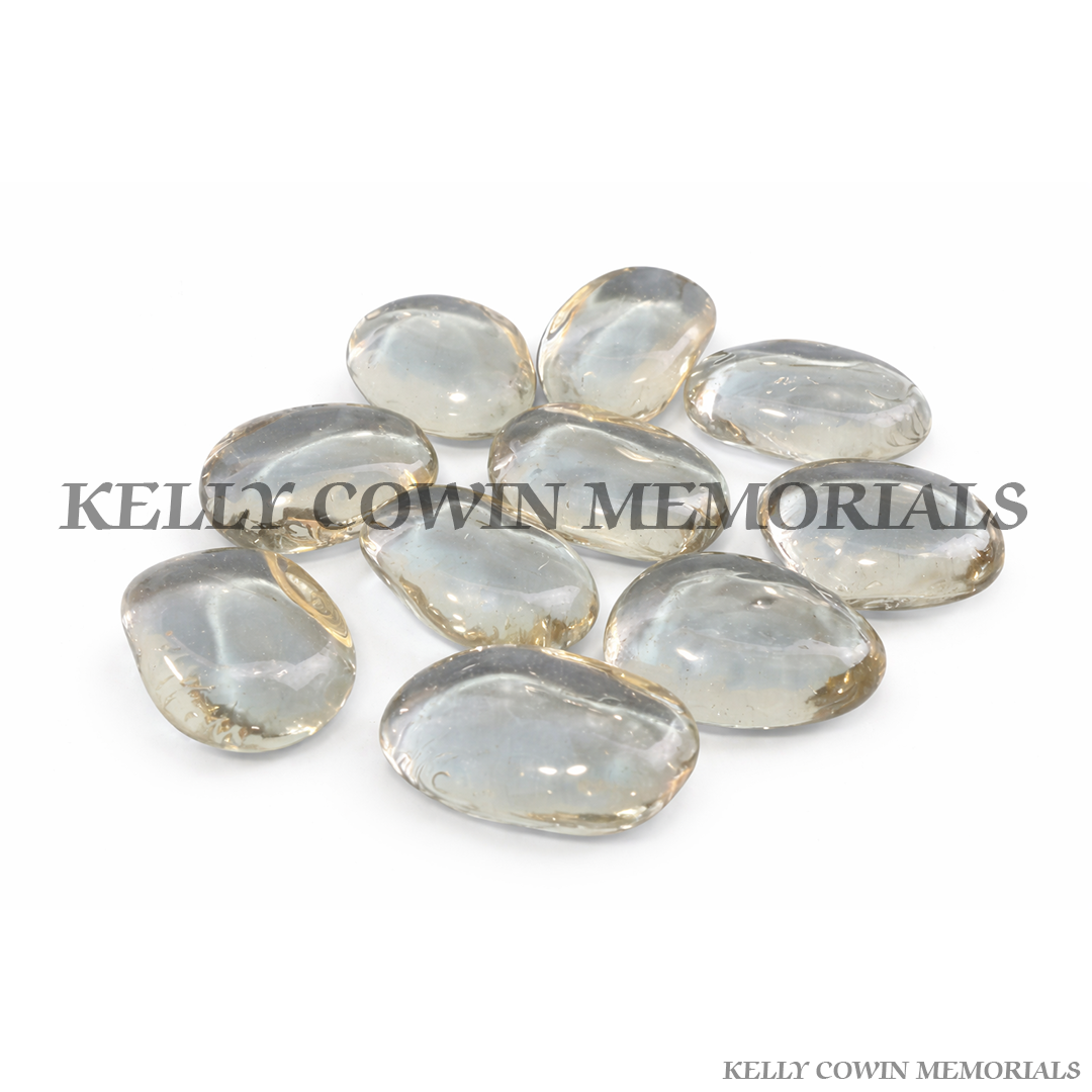Clear glass pebbles for grave memorial supplied in Dublin by Kelly Cowin Memorials with nationwide delivery across Ireland.