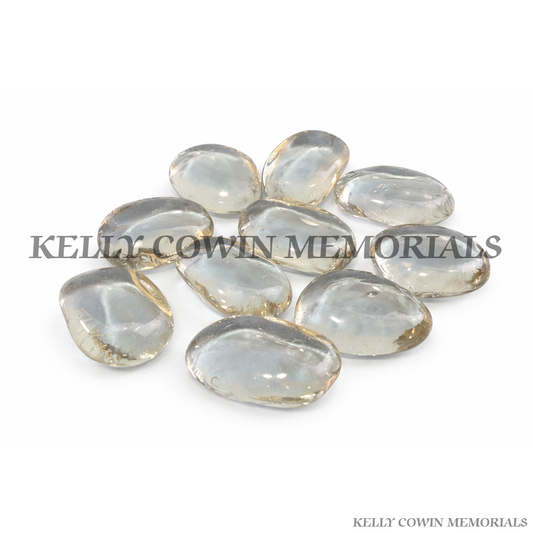 Clear glass pebbles for grave memorial supplied in Dublin by Kelly Cowin Memorials with nationwide delivery across Ireland.