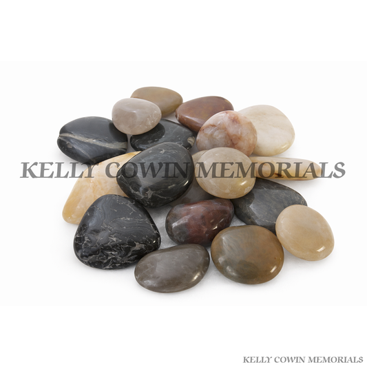 Coloured polished cobbles for grave memorial supplied in Dublin by Kelly Cowin Memorials with nationwide delivery across Ireland.