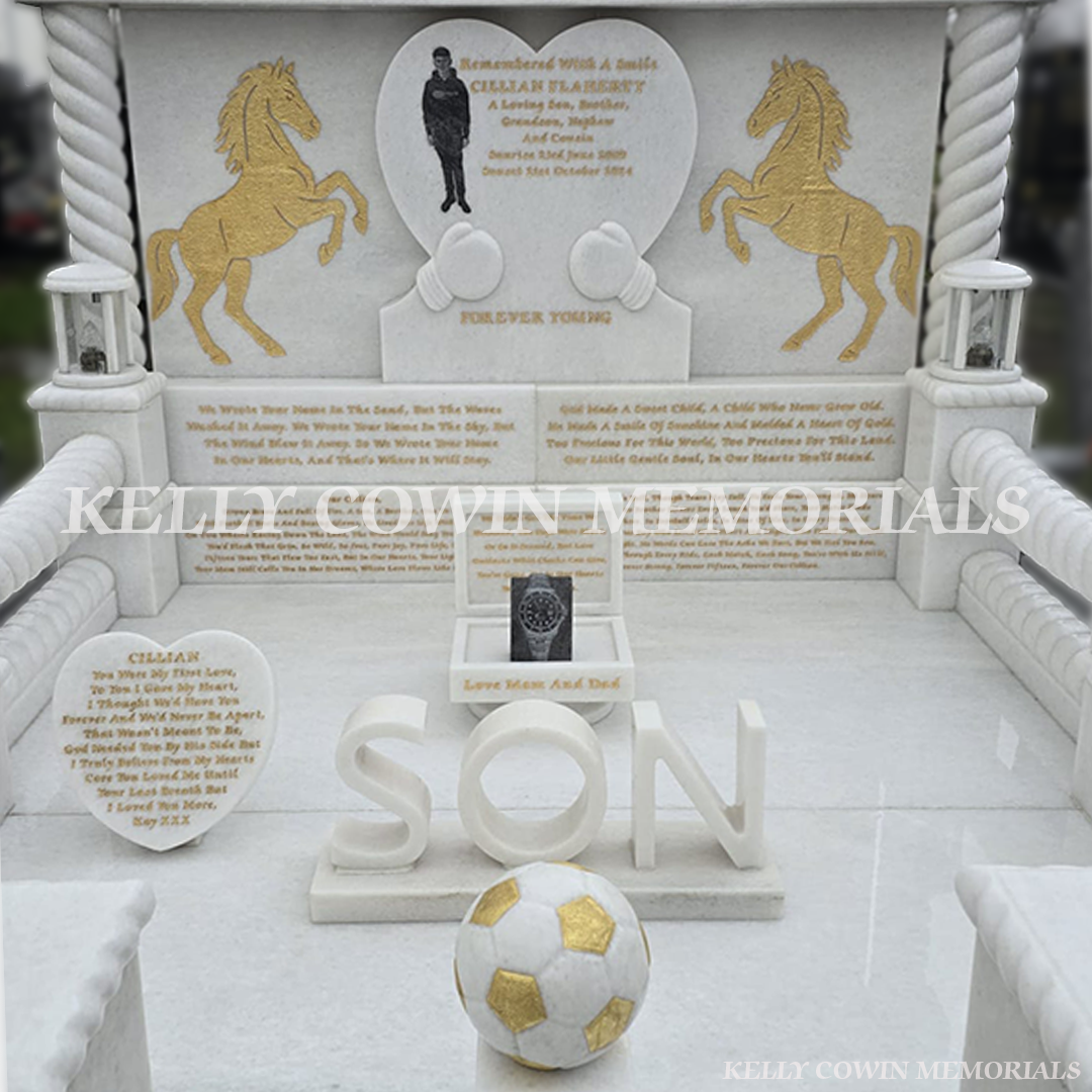Crystal White marble custom children’s memorial interior with heart plaque, gold inscriptions and accessories in Mulhuddart Cemetery Dublin
