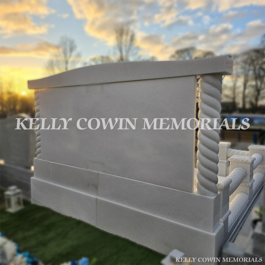 Back view of a Crystal White marble custom heart headstone with twisted rail kerbing and gold leaf engraving in Mulhuddart Cemetery Dublin