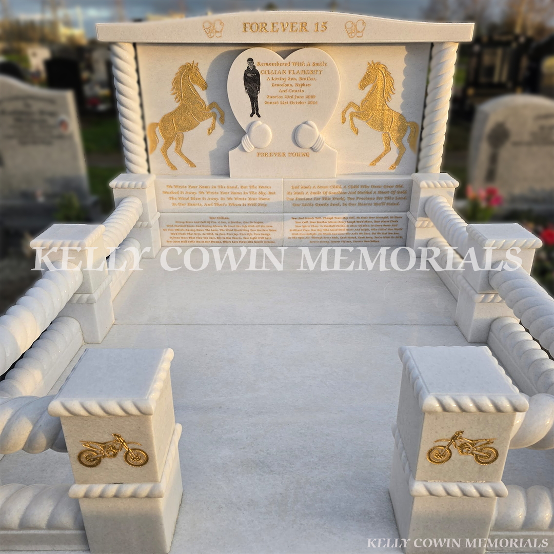 Zoomed view of a Crystal White marble custom heart headstone with twisted rail kerbing and gold leaf engraving in Mulhuddart Cemetery Dublin