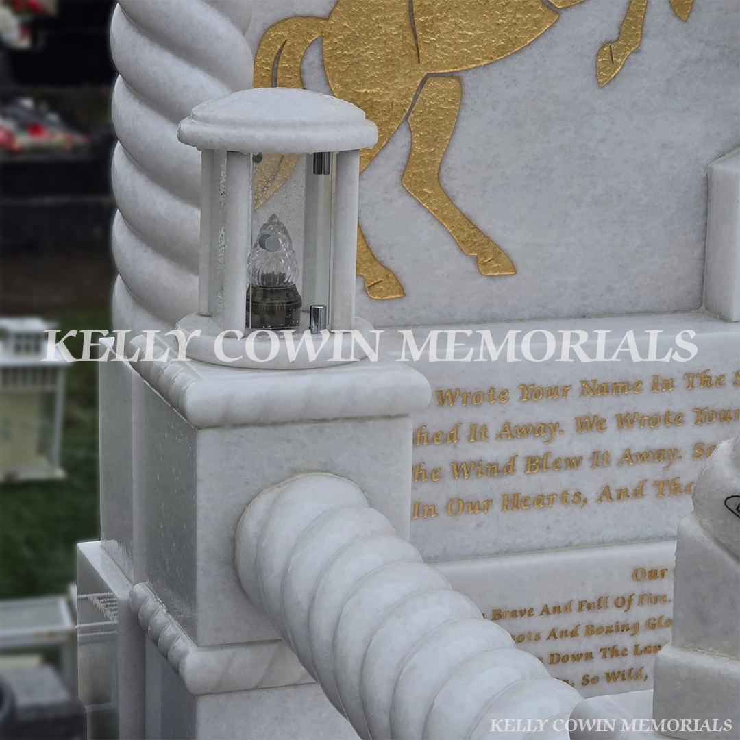 Crystal White marble full kerbed children’s memorial with custom accessories in Mulhuddart Cemetery Dublin