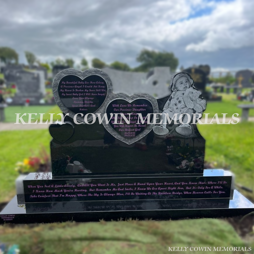 Black granite heart shaped headstone with purple inscription in Illaunamanagh Cemetery County Clare