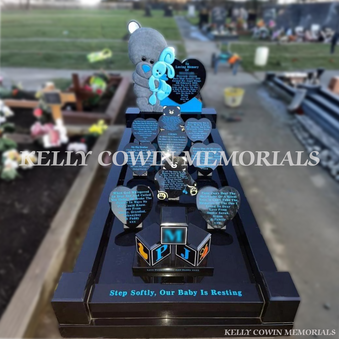 Black granite teddy bear heart children’s headstone with full kerbing and baby blocks in Fingal Cemetery Dublin